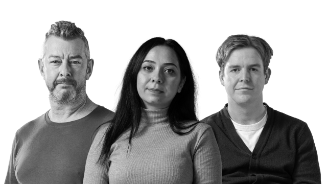 black and white image of two men and a woman