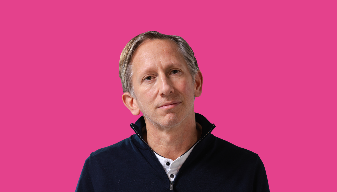 man with grey hair and beard